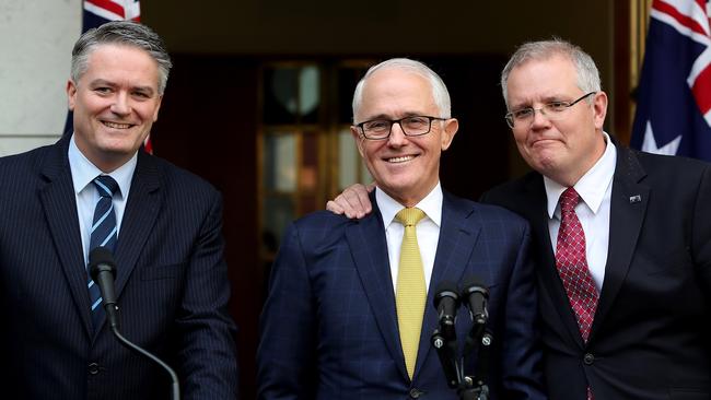 Malcolm Turnbull flanked by Mathias Cormann, left, and Scott Morrison at a press conference where they professed their loyalty. Picture: Kym Smith