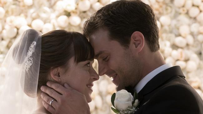 Dakota Johnson and Jamie Dornan in a scene from film Fifty Shades Freed