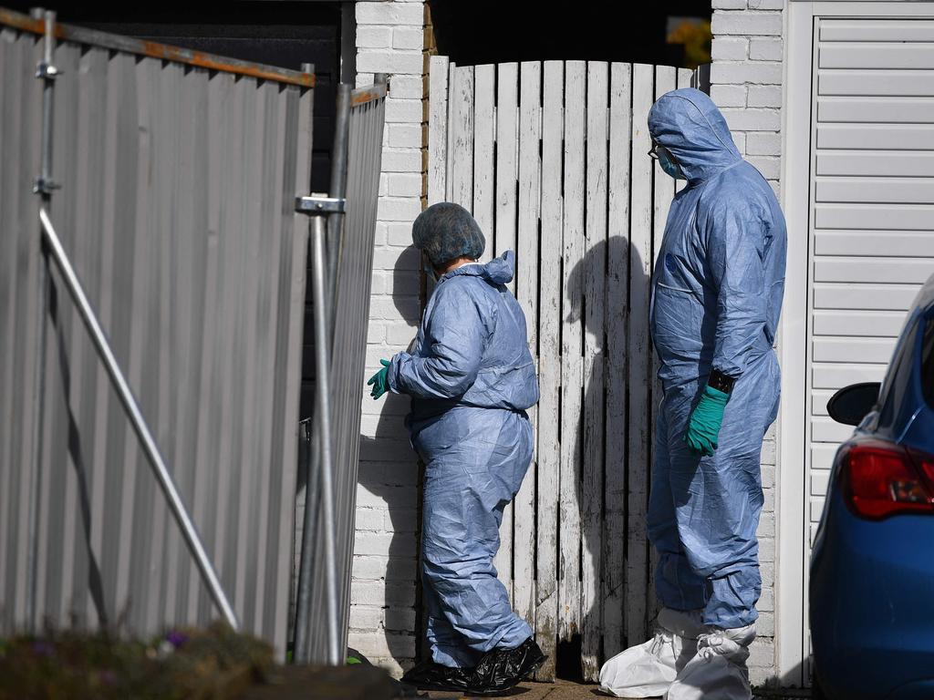 Members of a forensics team at the home of a murder suspect in Deal, Kent on March 11, after the discovery of human remains in nearby woodland. Picture: Ben Stansall / AFP