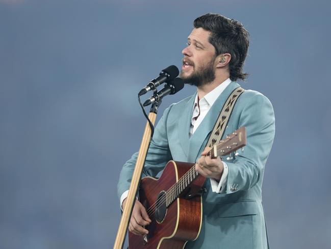 SYDNEY, AUSTRALIA - JUNE 05:  Dylan Wright sings the national anthem before  game one of the 2024 Men's State of Origin Series between New South Wales Blues and Queensland Maroons at Accor Stadium on June 05, 2024 in Sydney, Australia. (Photo by Cameron Spencer/Getty Images)