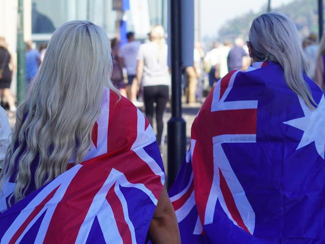 Sydney, New South Wales, Australia, January 26, 2023. On Australia Day many Australians show pride in their country by wearing the national flag