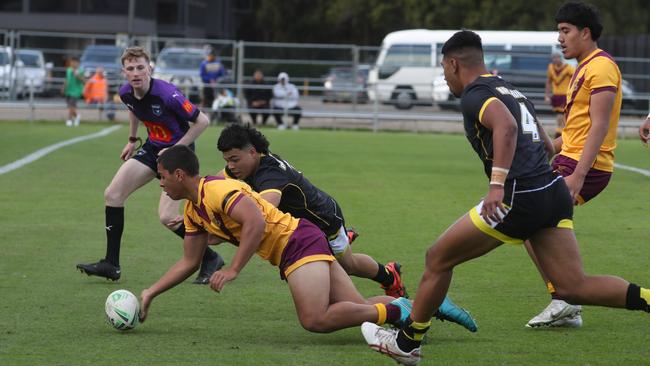 Holy Cross prevented this potential try with some desperate defending.