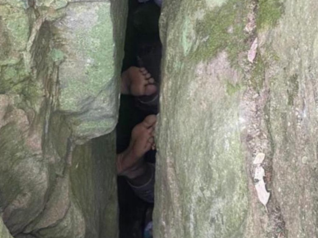 Images of the daring rescue quickly went viral, showing only Campbell’s feet protruding from the crevice.