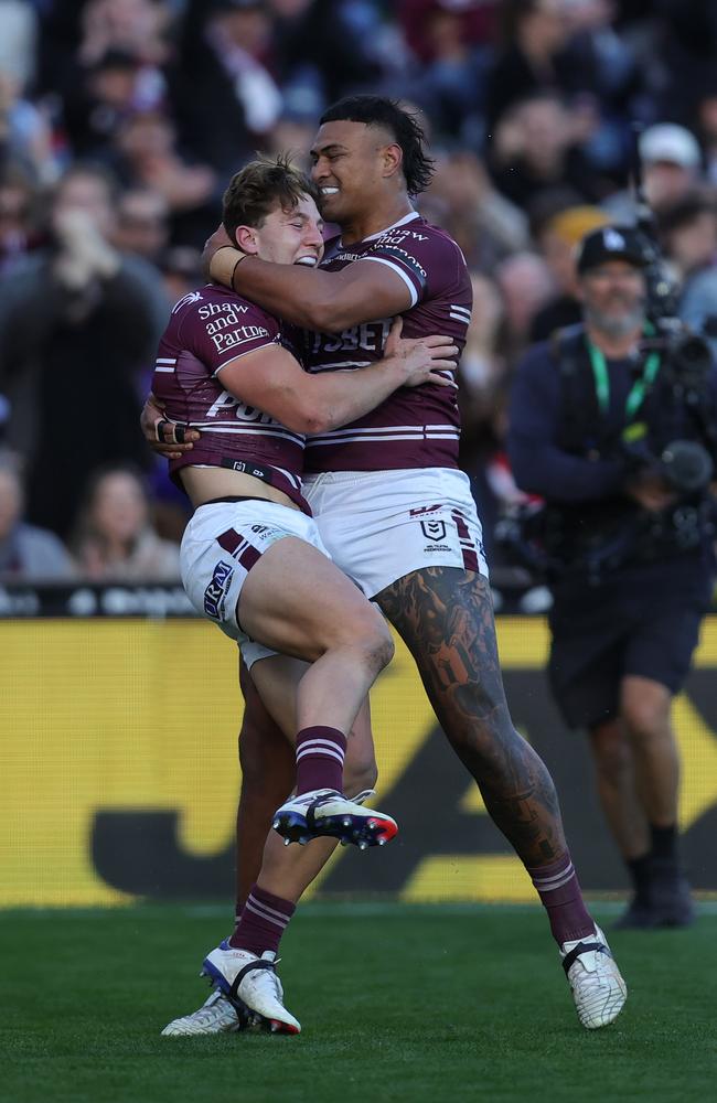 Jamie Humphreys celebrates scoring on debut with Haumole Olakau'atu. Picture: Jason McCawley/Getty Images