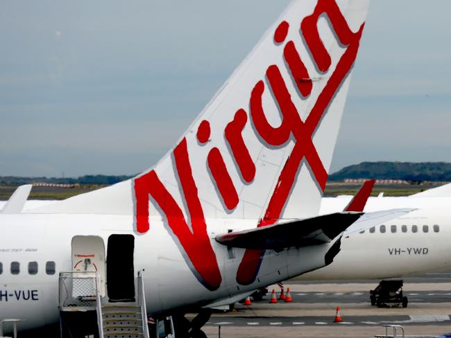 SYDNEY, AUSTRALIA - NewsWire Photos - SEPTEMBER 09, 2022: General generic editorial stock image of Virgin airplane at Sydney Domestic Airport. Picture: NCA NewsWire / Nicholas Eagar