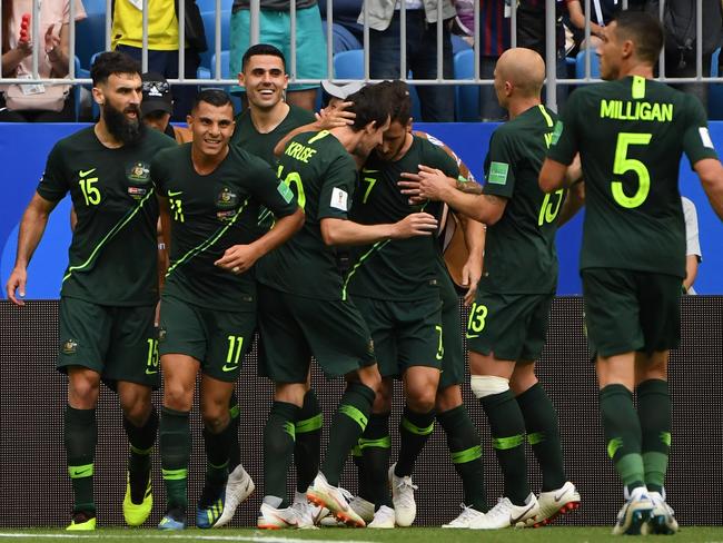 More goals needed: the Socceroos celebrate Mile Jedinak’s penalty against Denmark. Pic: AAP