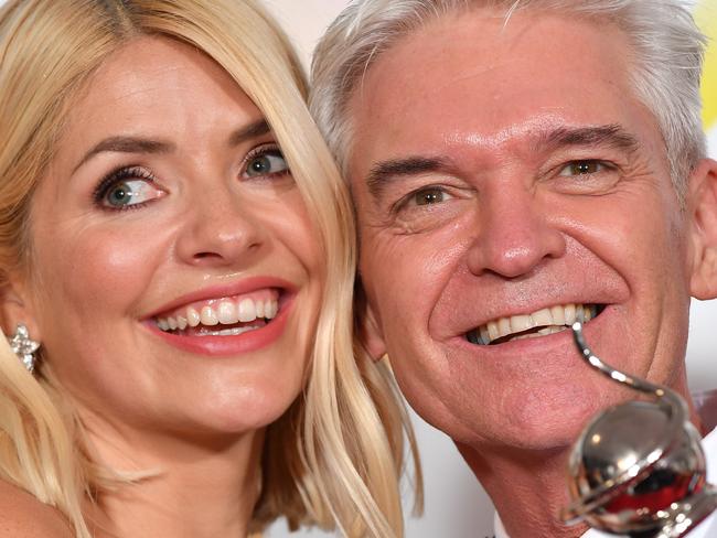 LONDON, ENGLAND - JANUARY 28: Holly Willoughby and Phillip Schofield pose with the award for Live Magazine Show for 'This Morning' in the winners room attends the National Television Awards 2020 at The O2 Arena on January 28, 2020 in London, England. (Photo by Gareth Cattermole/Getty Images)