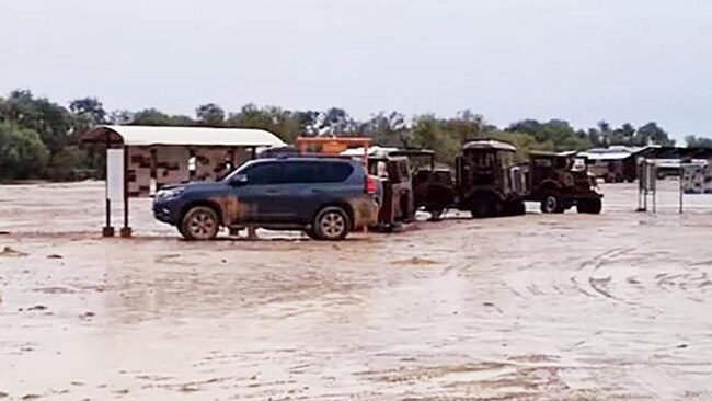 Four-wheel-drives waiting out the rain at Mungerannie Hotel last week. Picture: Facebook