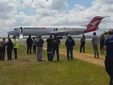 More than 100 passengers had to evacuate a Qantas plane after it landed from Newman with reports of smoke in the cockpit. Picture: Channel Nine News