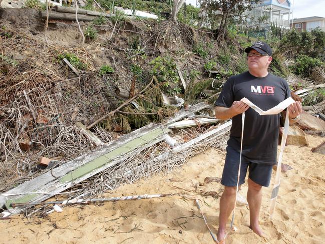 Wamberal resident Warren Hughes was previously asked by council to remove a $50,000 sandbag wall he built to protect his home. Picture: Mark Scott