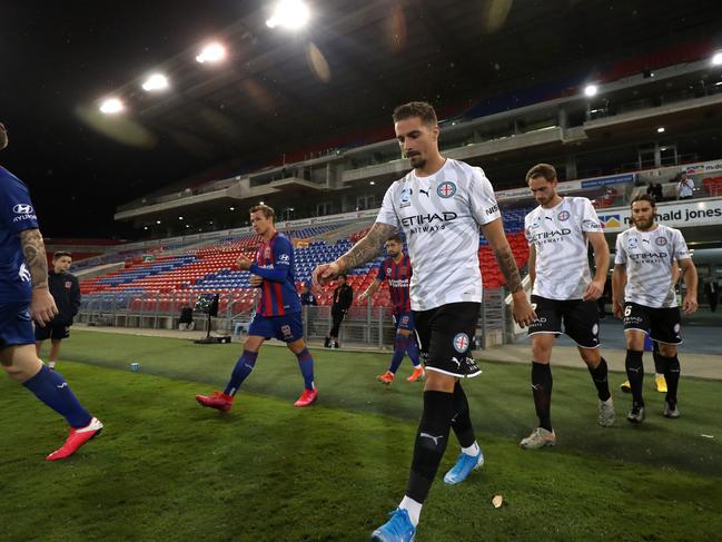 NEWCASTLE, AUSTRALIA - MARCH 23: Jamie Maclaren of Melbourne City walks out to start the game during the round 26 A-League match between the Newcastle Jets and Melbourne City at McDonald Jones Stadium on March 23, 2020 in Newcastle, Australia. (Photo by Tony Feder/Getty Images)