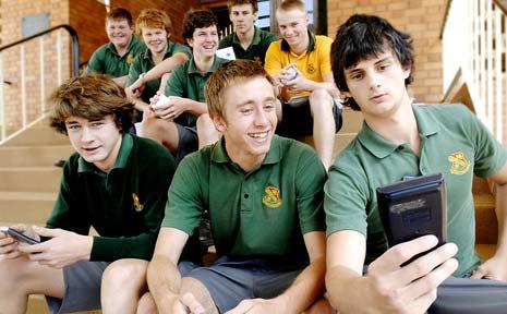 ONE DOWN: St John’s College Woodlawn students (front, from left) Mitchell Krause, 17, Matt Fitness, 17, and Tim Yorke, 18, and (rear, from left) Pat Kelly, 18, Mitch Baker, 18, Ben Durance, 18, Paul O’Neill, 17, and Luke Saltmarsh, 18, after completing their first HSC exam. . Picture: DAVID NIELSEN