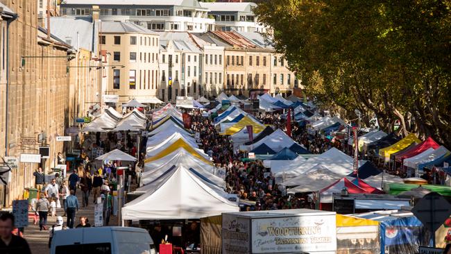 Set among the historic Georgian sandstone buildings of Salamanca Place in Hobart, this famous market attracts thousands of locals and visitors every Saturday of the year. Photo - Alastair Bett ESCAPE 15 May 2022