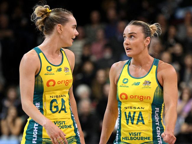 INVERCARGILL, NEW ZEALAND - OCTOBER 19: Kiera Austin and Liz Watson of Australia talk during game three of the Constellation Cup series between New Zealand Silver Ferns and Australia Diamonds at ILT Stadium Southland on October 19, 2023 in Invercargill, New Zealand. (Photo by Joe Allison/Getty Images)