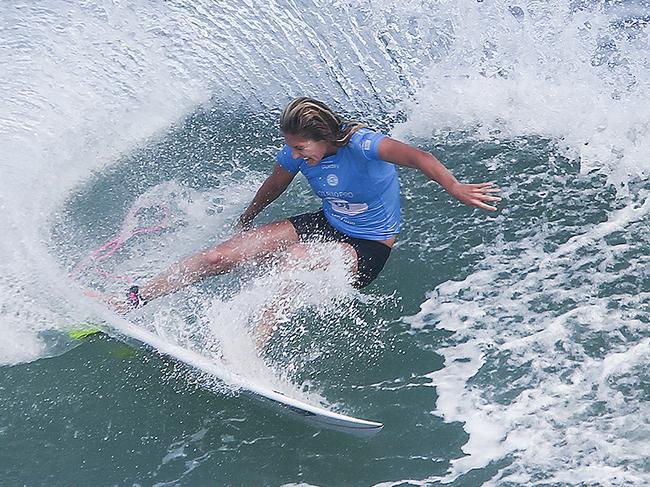 Stephanie Gilmore of Australia (pictured) winning her round three at the Oi Rio Pro in Rio de Janeiro, Brasil on Wednesday May 11, 2016. PHOTO: © WSL / Smorigo SOCIAL: @wsl @danielsmorigo This image is the copyright of the World Surf League and is provided royalty free for editorial use only, in all media now known or hereafter created. No commercial rights granted. Sale or license of the images is prohibited. This image is a factually accurate rendering of what it depicts and has not been modified or augmented except for standard cropping and toning. ALL RIGHTS RESERVED.