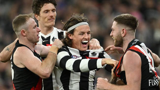 Jack Ginnivan of the Magpies and Jayden Laverde of the Bombers. Picture: Quinn Rooney/Getty Images