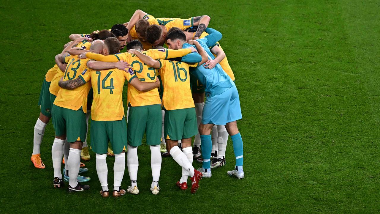 Australia gathers ahead of the Qatar 2022 World Cup Group D football match between France and Australia at the Al-Janoub Stadium in Al-Wakrah, south of Doha on November 22, 2022. (Photo by Anne-Christine POUJOULAT / AFP)