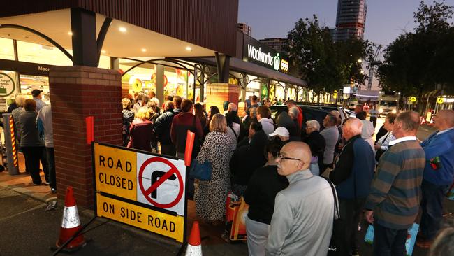 Elderly people queue at Woolworths in Moonee Ponds. Picture: David Geraghty / The Australian.