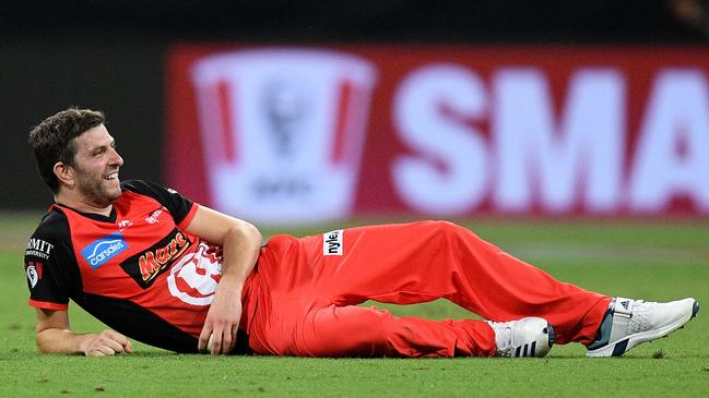 A bemused Gurney lays on the ground after one of two dropped catches of his own bowling against Sydney Thunder. Picture: AAP