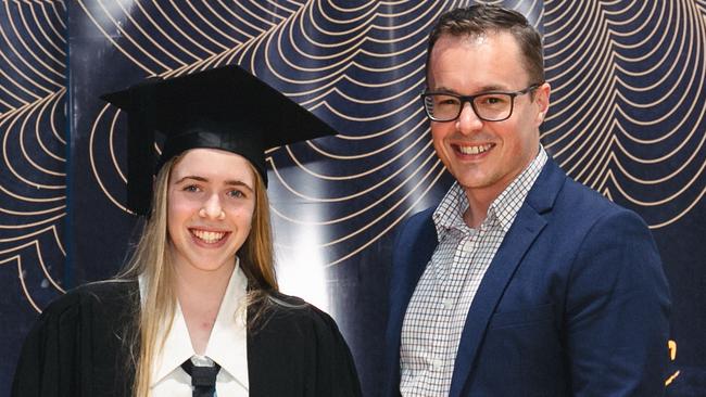 Cooloola Christian College's Dux of 2023 was Talia Harris. She receives her award with Ben Ellingsen from Kingdom Financial.