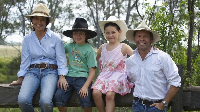 Troy Cassar-Daley and his wife Laurel and their children, Clay and Jem at their farm.