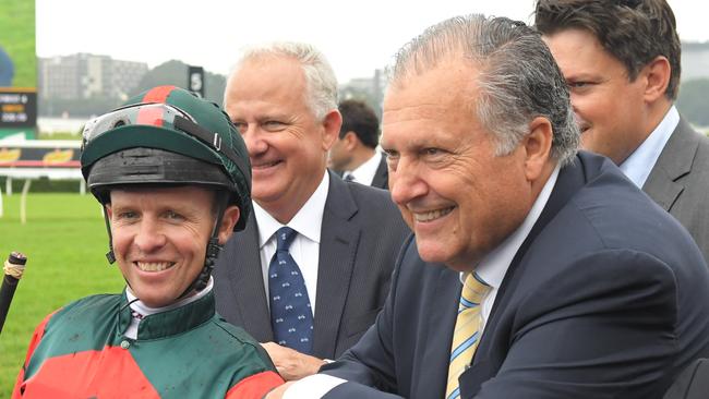 Jockey Kerrin McEvoy and part-owner John Messara couldn’t hide their delight after The Autumn Sun’s win. Picture: AAP 