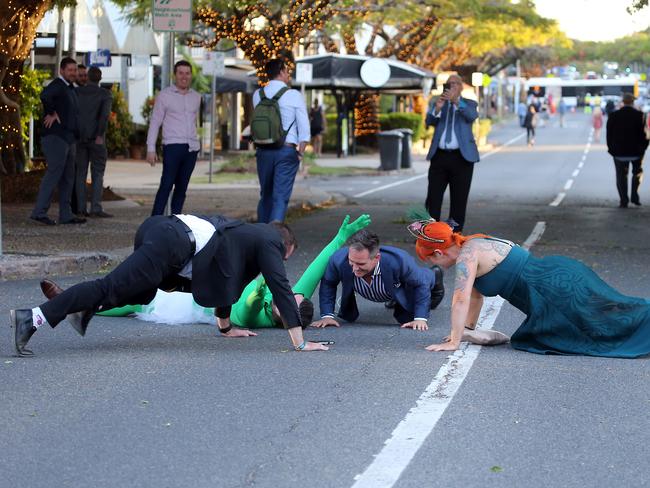 People leaving the Melbourne Cup Day at Eagle Farm. Picture: AAP/Richard Gosling