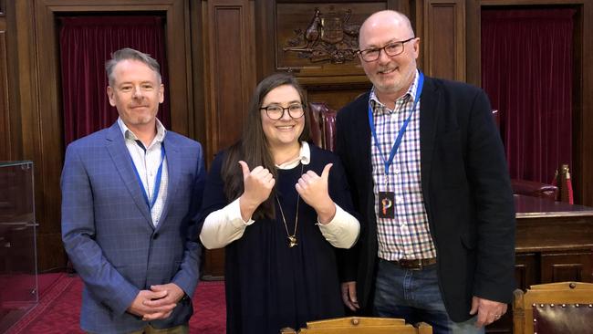 Chris Kenny, right, with Alice Workman, centre, and Mark Kenny, left, at Canberra Writers Festival.