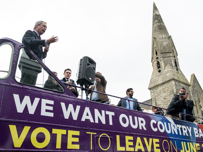 UK Independence Party leader Nigel Farage (R) campaigns for Brexit in Sittingbourne on June 13, 2016. Britain's opposition Labour Party today scrambled to make the case for Europe to its members as world stock markets slipped amid concern over a British exit from the EU in a knife-edge referendum next week. / AFP PHOTO / CHRIS J RATCLIFFE