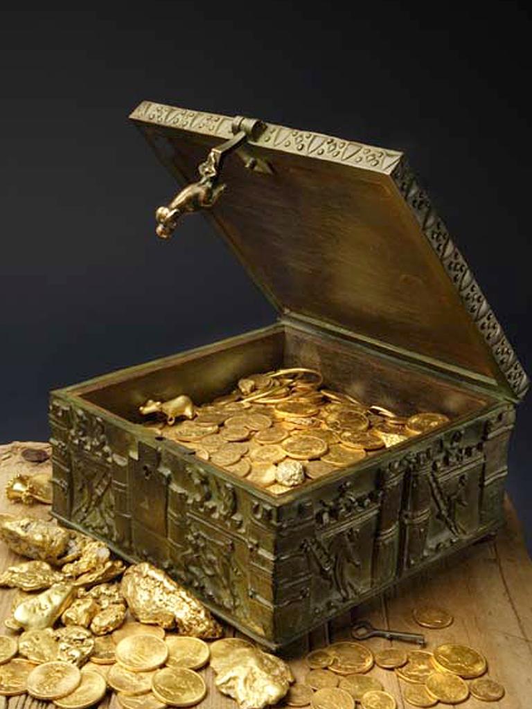 This undated photo provided by Forrest Fenn shows a chest said to contain gold dust, hundreds of rare gold coins, gold nuggets and other artefacts. Picture: AP/Addison Doty