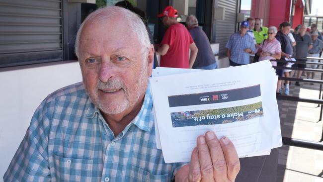 John Ayres of O’Halloran Hill was among about 50 people lined up to buy tickets at the Entertainment Centre at Hindmarsh, after trying unsuccessfully online. Picture: Dean Martin