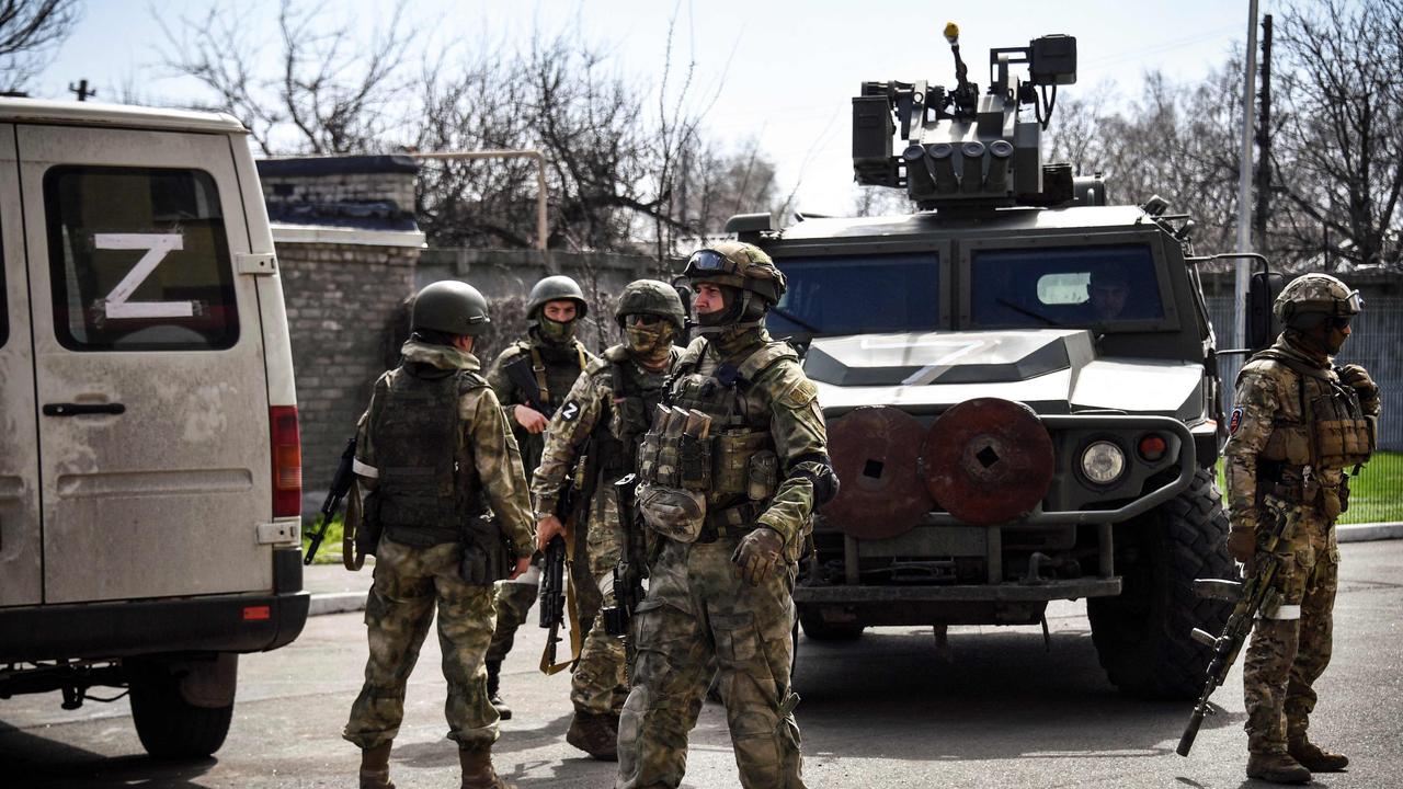 Russian soldiers patrol a street in Volnovakha in the self-proclaimed Donetsk People's Republic (DNR). Picture: Alexander Nemenov/AFP