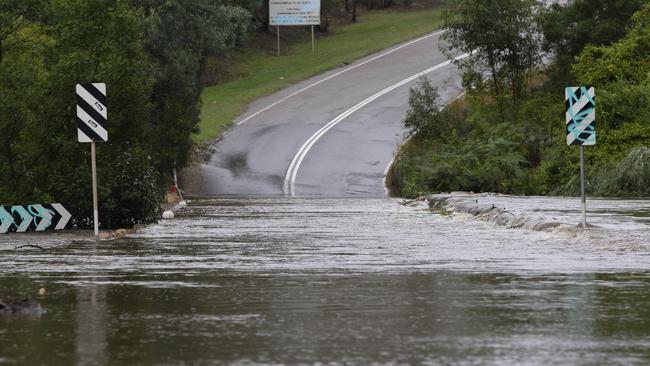 Flash flood in Hurley St, Campbelltown, sparked by blocked pipes in ...