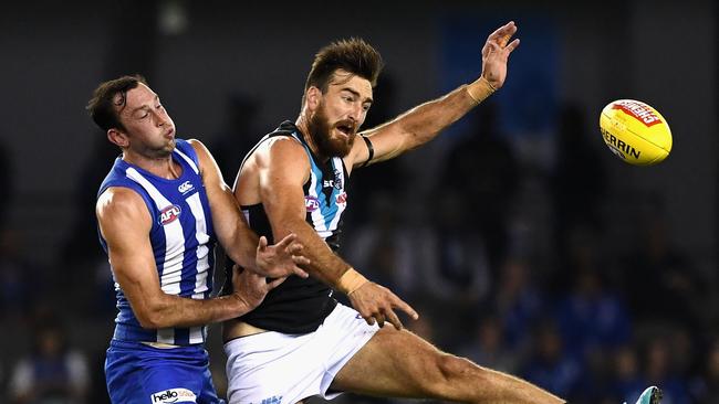 Charlie Dixon competes against North Melbourne’s Todd Goldstein. Picture: Quinn Rooney/Getty Images