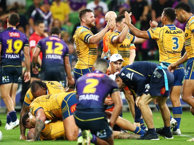 MELBOURNE, AUSTRALIA - MARCH 26:  The Eels celebrate victory after a try in golden point time during the round three NRL match between the Melbourne Storm and the Parramatta Eels at AAMI Park, on March 26, 2022, in Melbourne, Australia. (Photo by Kelly Defina/Getty Images)