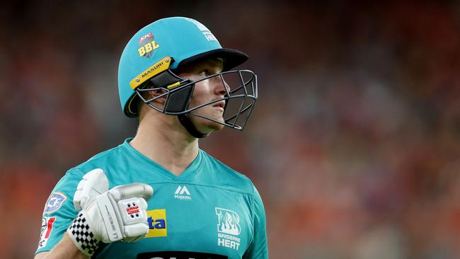 Max Bryant of the Heat leaves the field after being dismissed during the Big Bash League (BBL) cricket match between the Perth Scorchers and the Brisbane Heat at Optus Stadium in Perth, Saturday, January 11, 2020. (AAP Image/Richard Wainwright