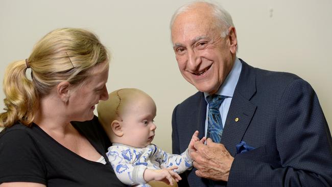 Professor David David with a Craniofacial Unit patient in 2015. Picture: Keryn Stevens