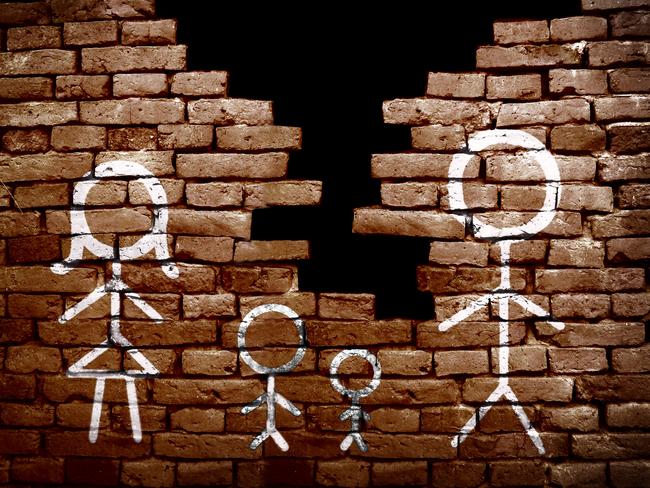 Couple with children stick figures on broken brick wall -- divorce concept. istock