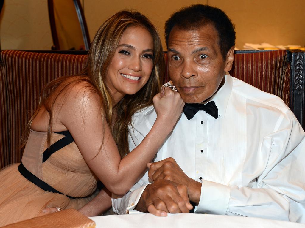 March 23, 2013: With singer Jennifer Lopez at Muhammad Ali’s Celebrity Fight Night in Phoenix, Arizona.