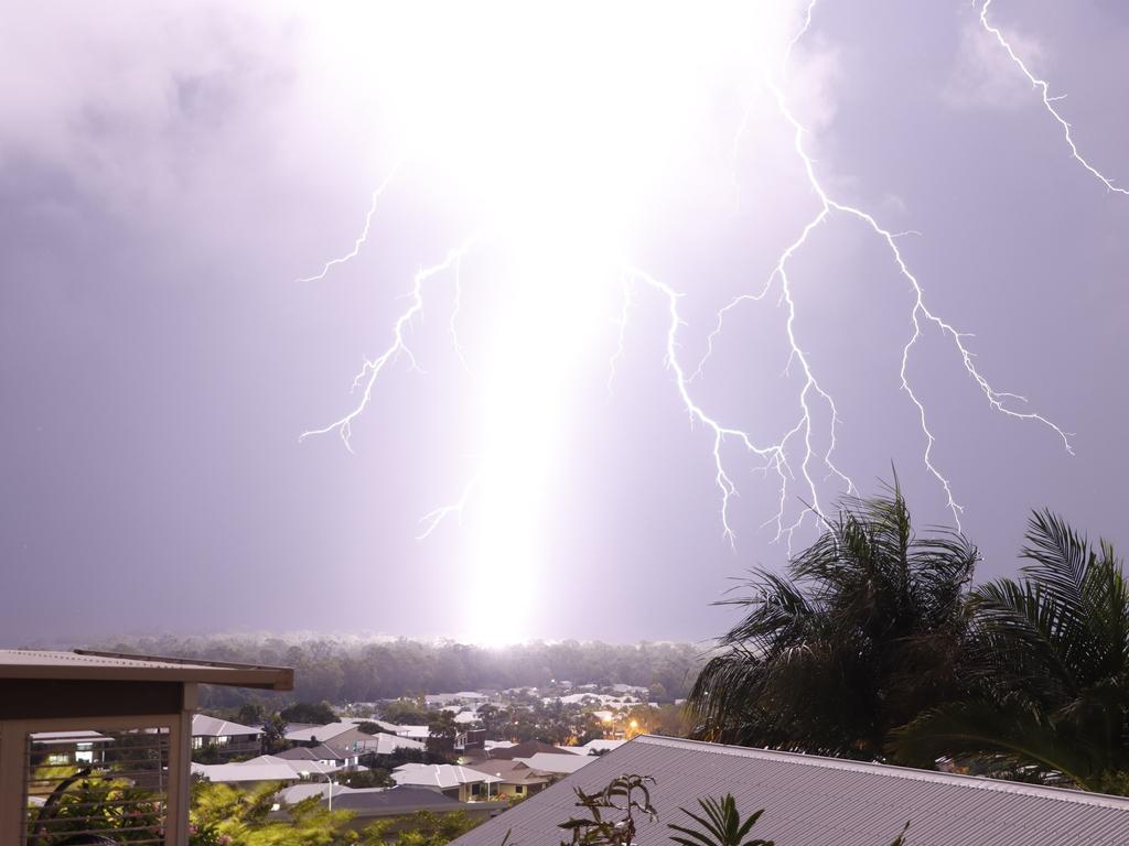 A picture of a lightning strike off Bushland Beach in the NYE storm. Credit: Mark Carney