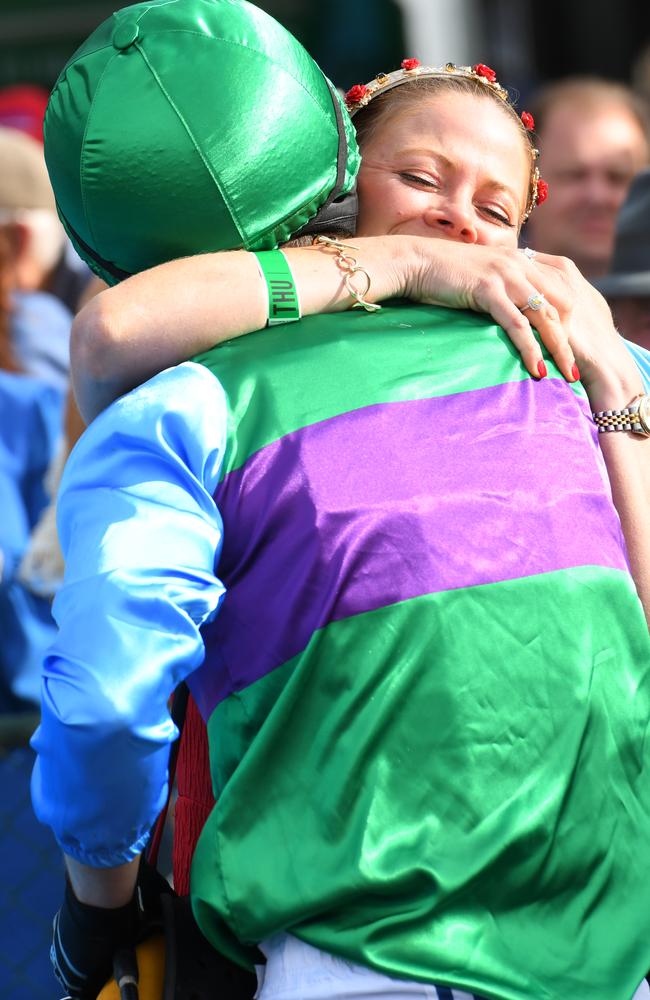 Steven Pateman is congratulated by his partner Jess Pateman after riding Zed Em to victory. 