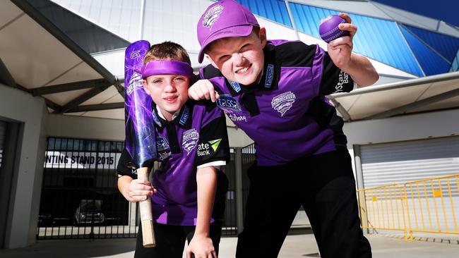 Brothers Lochlan Grundy, 11, and Riley Grundy, 12, of Hobart, were some of the Hobart Hurricanes fans getting in early to grab tickets for the home semi-final game at Blundstone Arena. Picture: NIKKI DAVIS-JONES