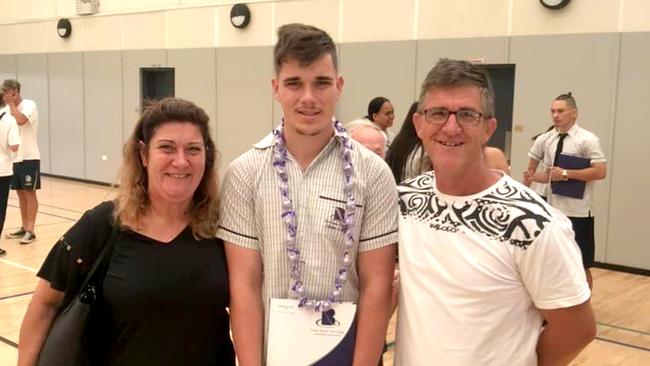 Michael Warburton (right) with wife Anita (left) and son Riley (centre). Photo: Supplied/Steve Pohlner