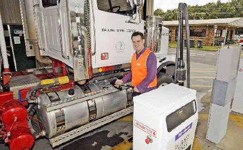 Fill it up: Councillor Ben Smith pumps B20 Biodiesel fuel consisting of beef and mutton fat combined with soy beans and conventional diesel into one of the Council’s 100 vehicles. Picture: Doug Eaton