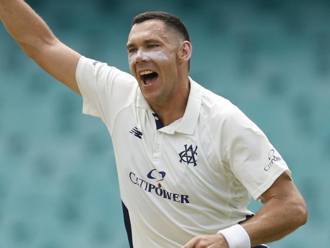 SYDNEY, AUSTRALIA - FEBRUARY 18: Scott Boland of Victoria celebrates the wicket of Josh Philippe of New South Wales during the Sheffield Shield match between New South Wales and Victoria at Sydney Cricket Ground, on February 18, 2025, in Sydney, Australia. (Photo by Darrian Traynor/Getty Images)