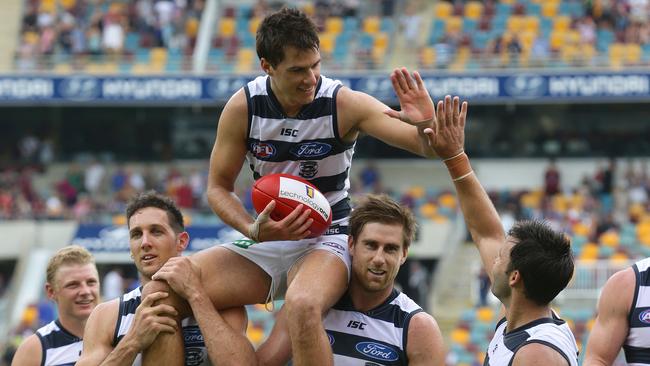 Mackie chaired off after his 200th. Picture: Darren England