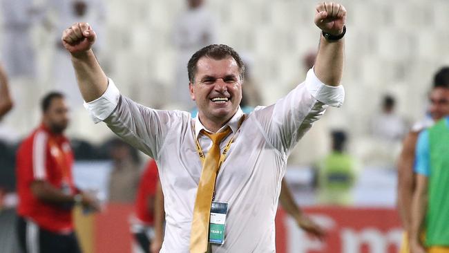 Pictured is Socceroos coach Ange Postecoglou celebrating.