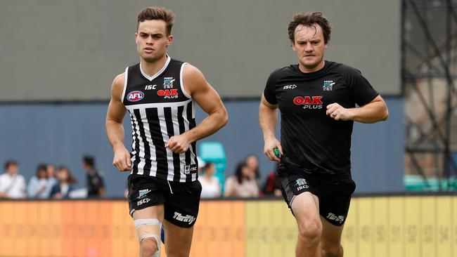 Karl Amon of the Power runs laps in Shanghai, China. Picture: Michael Willson/AFL Photos