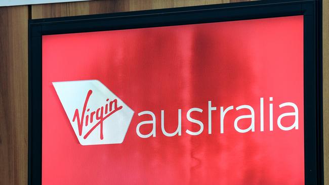 Virgin Australia is buckling under adjusted net debt of $5bn and for the half year it posted an $88.6m loss. Picture: AAP