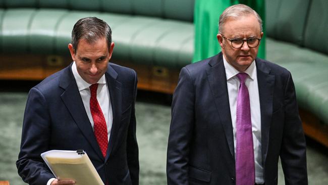 CANBERRA, AUSTRALIA - MAY 14: AustraliaÃ¢â¬â¢s Treasurer Jim Chalmers (L) and Prime Minister Anthony Albanese arrive before Chalmers delivers his budget speech at Parliament House on May 14, 2024 in Canberra, Australia. Australia's Labor government is grappling with a slowing economy, weaker commodity prices, soaring housing costs and a softening labor market as it prepares to unveil its federal budget on May 14. To counter these headwinds, the budget is expected to feature smaller revenue upgrades compared to recent years, while outlining the government's interventionist policies aimed at boosting domestic manufacturing and the transition to green energy. Critics warn that such industrial policies risk fueling inflation and diverting resources from more productive sectors of the economy. The budget is seen as a key opportunity for the Labor government to deliver broad economic support that analysts say is fundamental to re-election chances next year. (Photo by Tracey Nearmy/Getty Images)